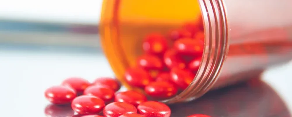 depositphotos_27357997-stock-photo-coated-red-tablet-and-brown