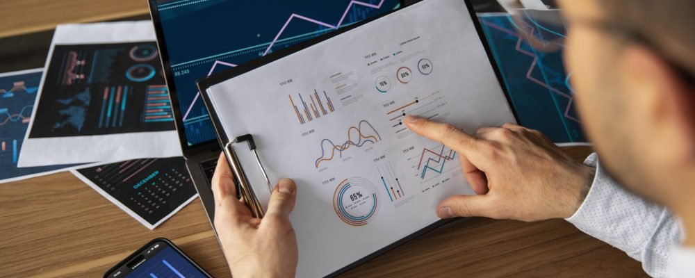 office-workers-using-finance-graphs